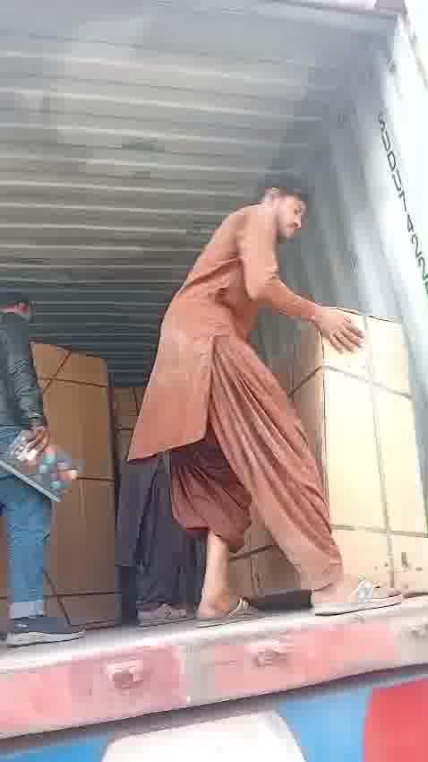 Loading furniture into export container