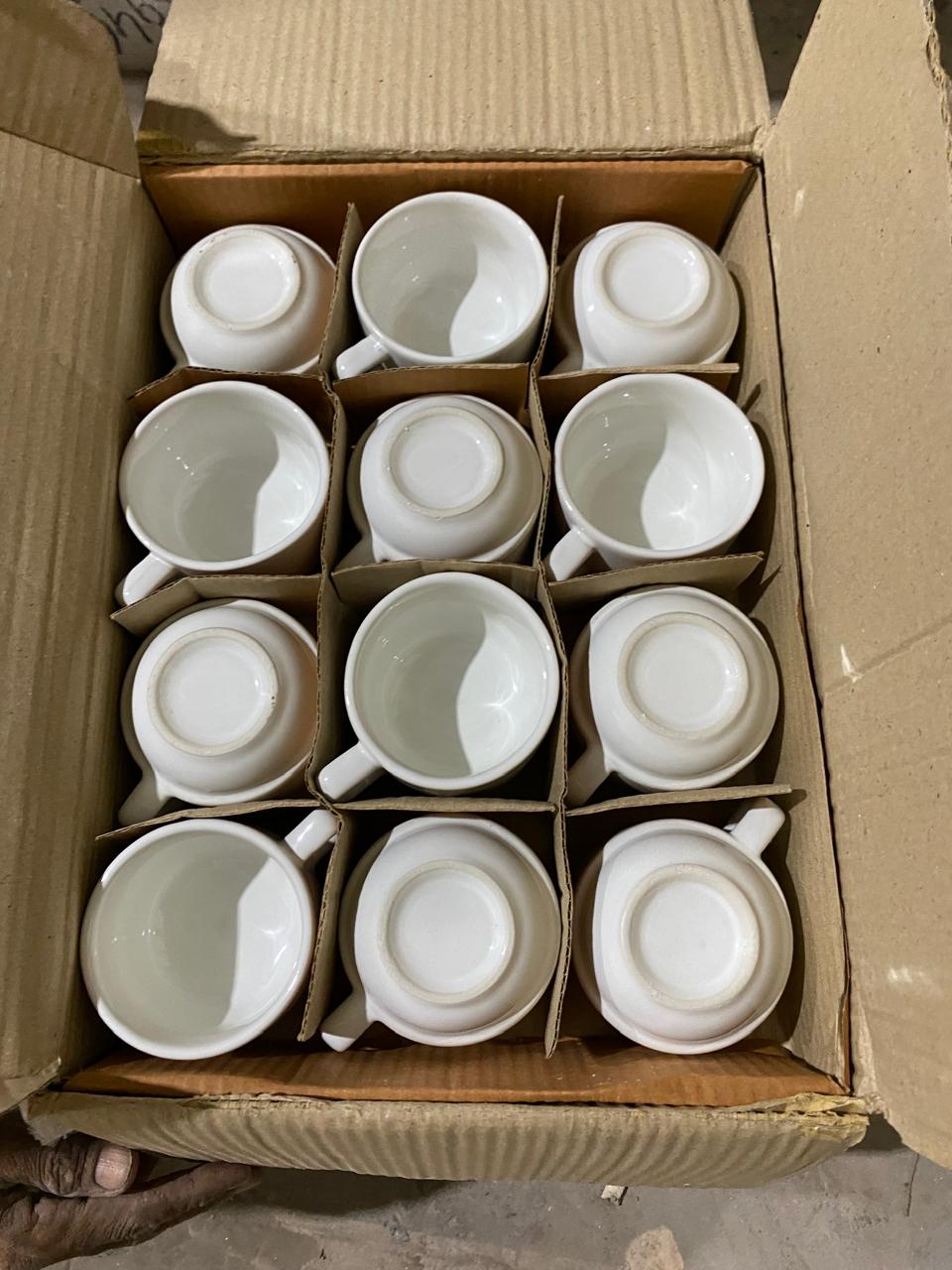 White porcelain cups individually packed in cardboard dividers for USA export
